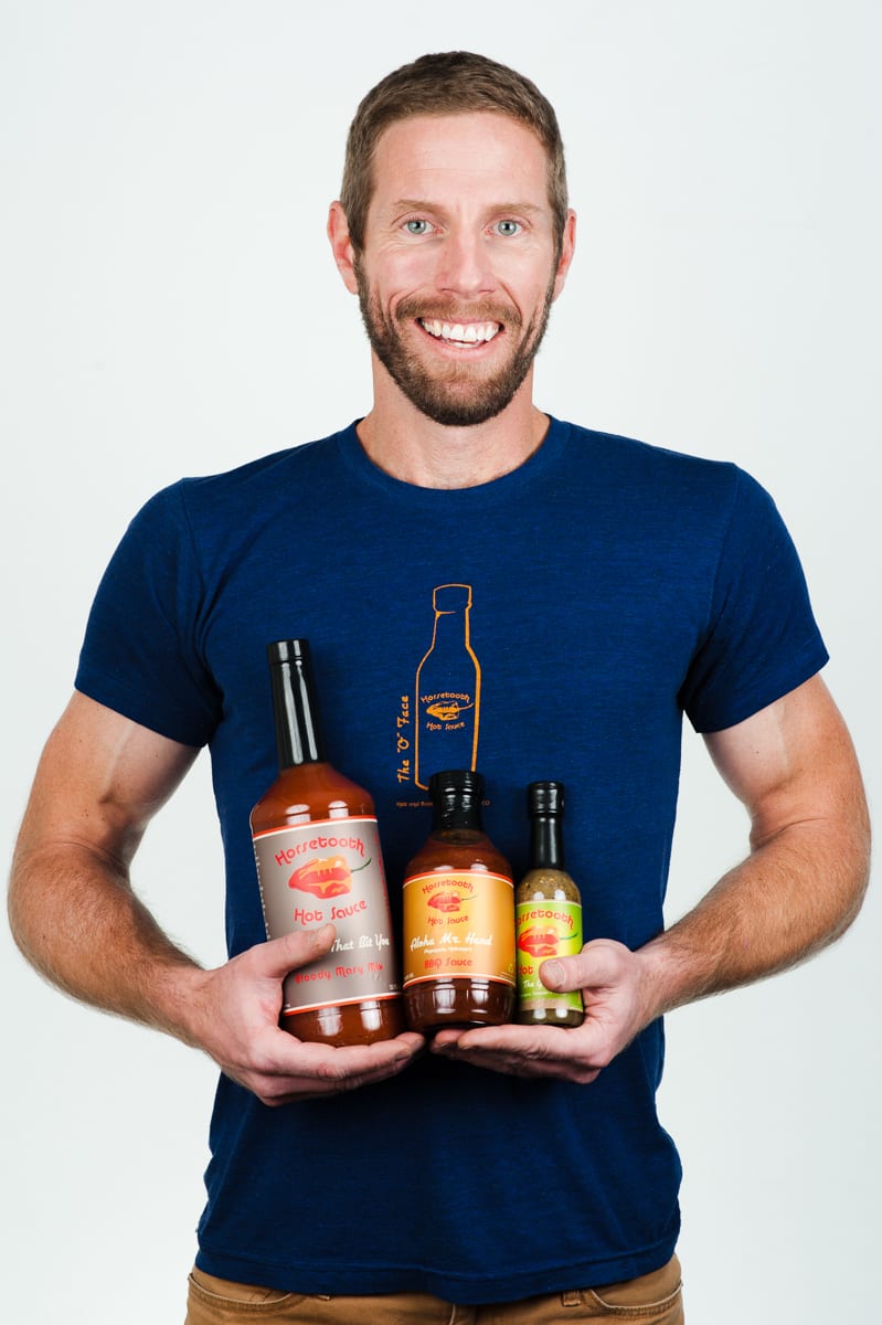 Headshot example showing proper head tilt and shoulder positioning for dynamic business portraits