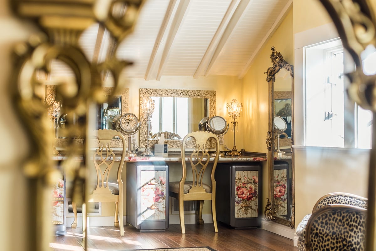 Side profile view of chandelier installation and room aesthetic in the Chandelier Barn