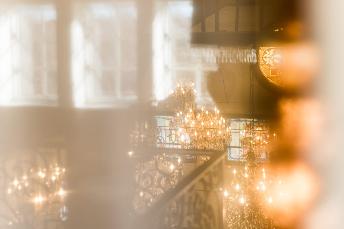 Guests enjoying the sophisticated ambiance of the Chandelier Barn event space