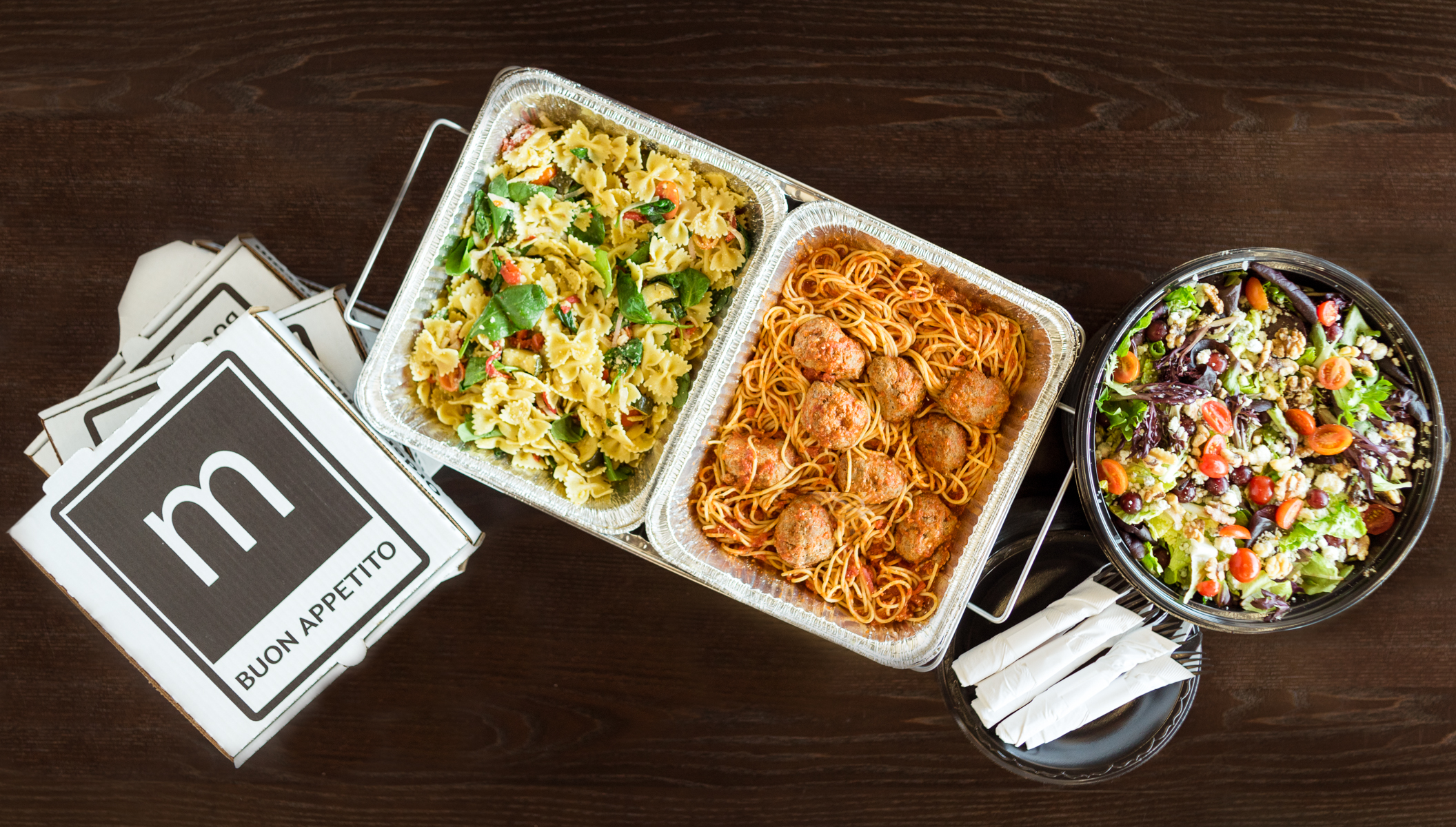 Pasta and salad dishes from Mici Handcrafted Italian in Denver, CO. 