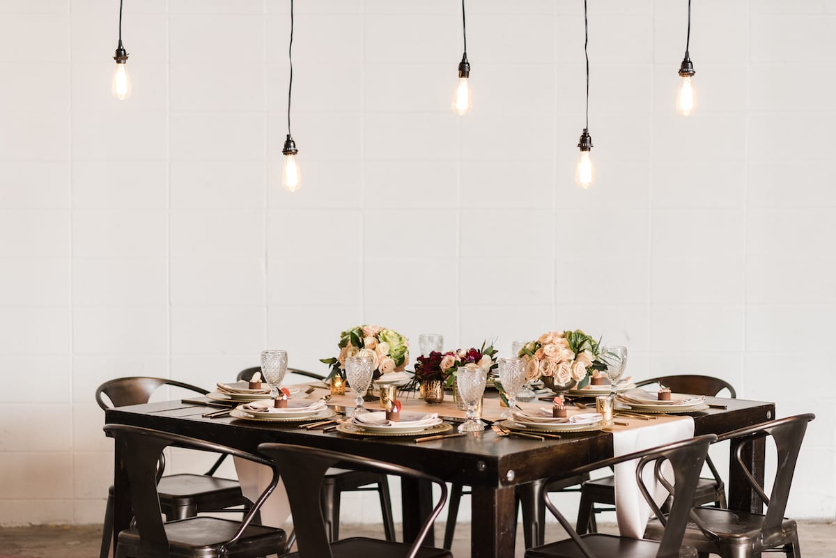 Styled wedding table at The Hangar at Stanley in Aurora, CO