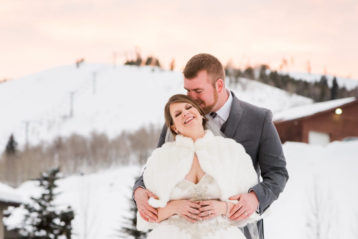 Bride and groom playful moment