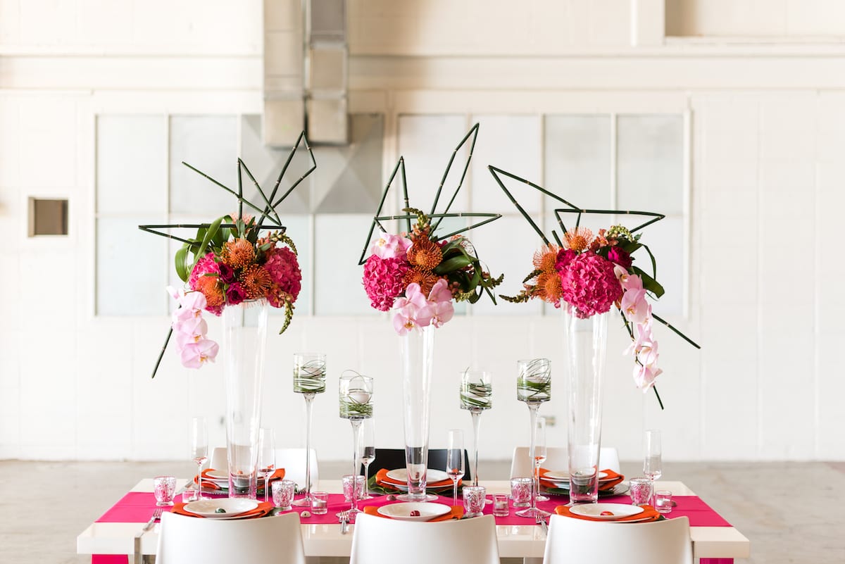 Three tall pink floral centerpieces
