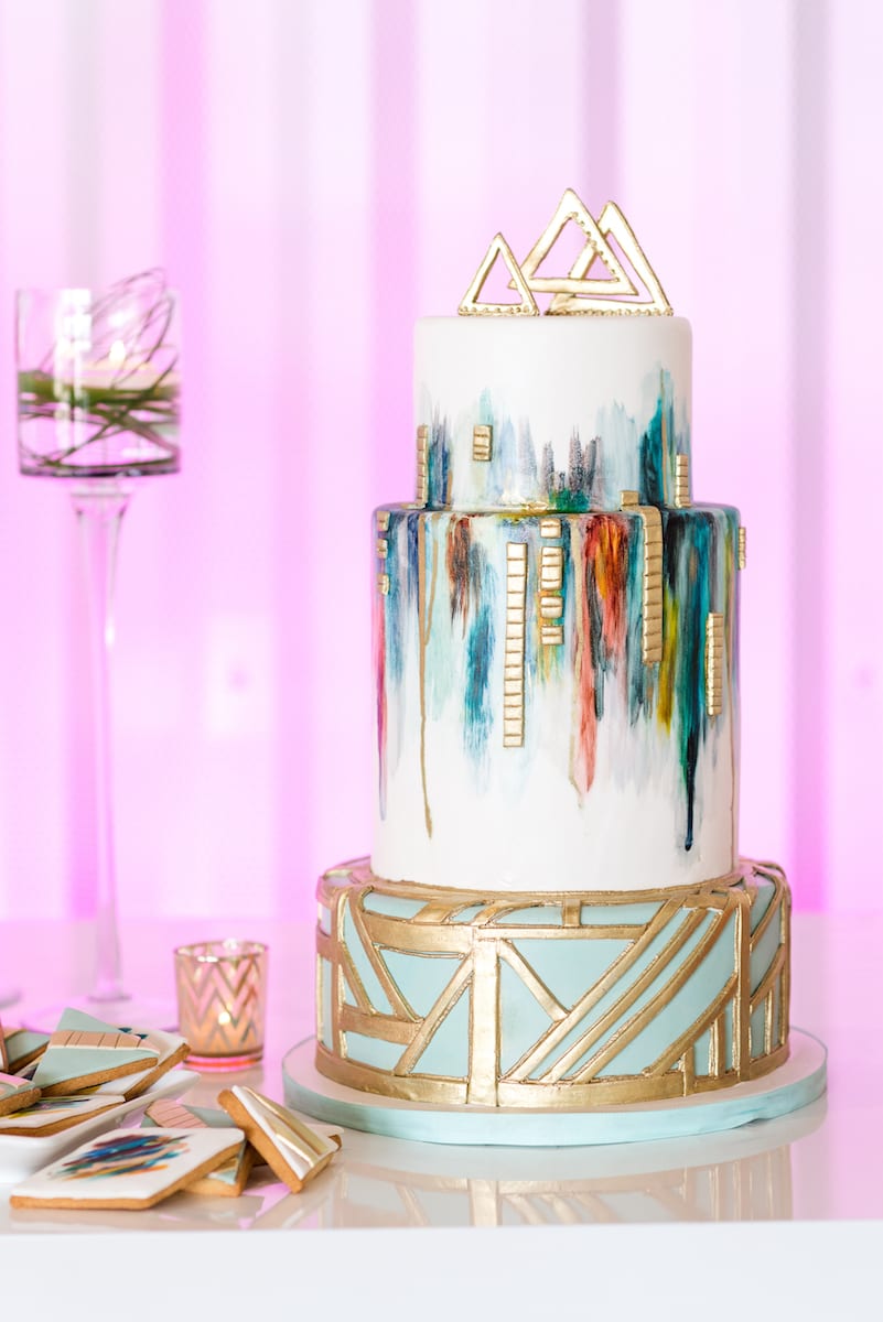 Watercolor inspired wedding cake with gold elements
