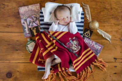 newborn amongst harry potter memorabilia