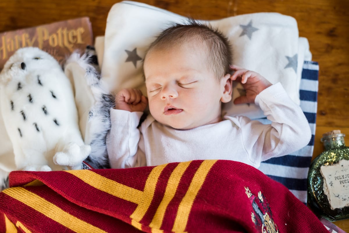 newborn amongst harry potter memorabilia 