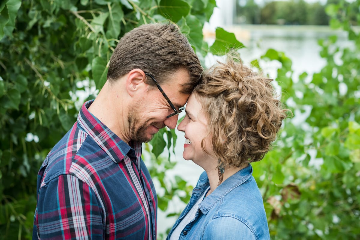 Couple looks into each others eyes | Family Photography | From the Hip Photo