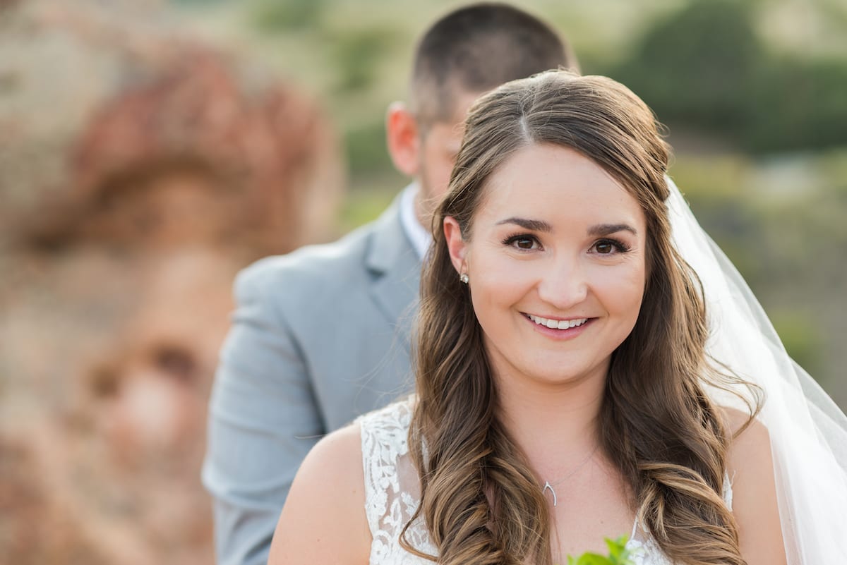 Bride and groom walk together with wedding party at Willow Ridge Manor mountain wedding