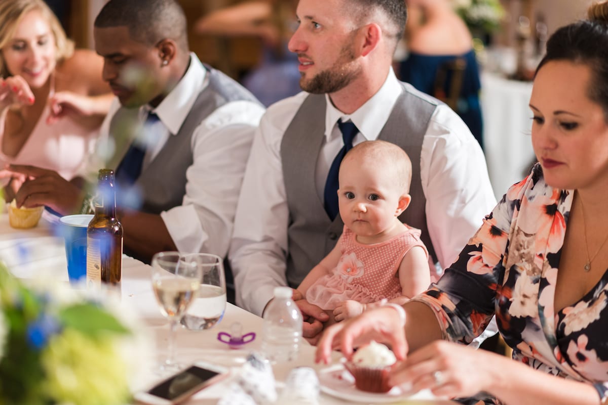 Bride and groom portrait with dramatic mountain sky behind them at Willow Ridge Manor wedding