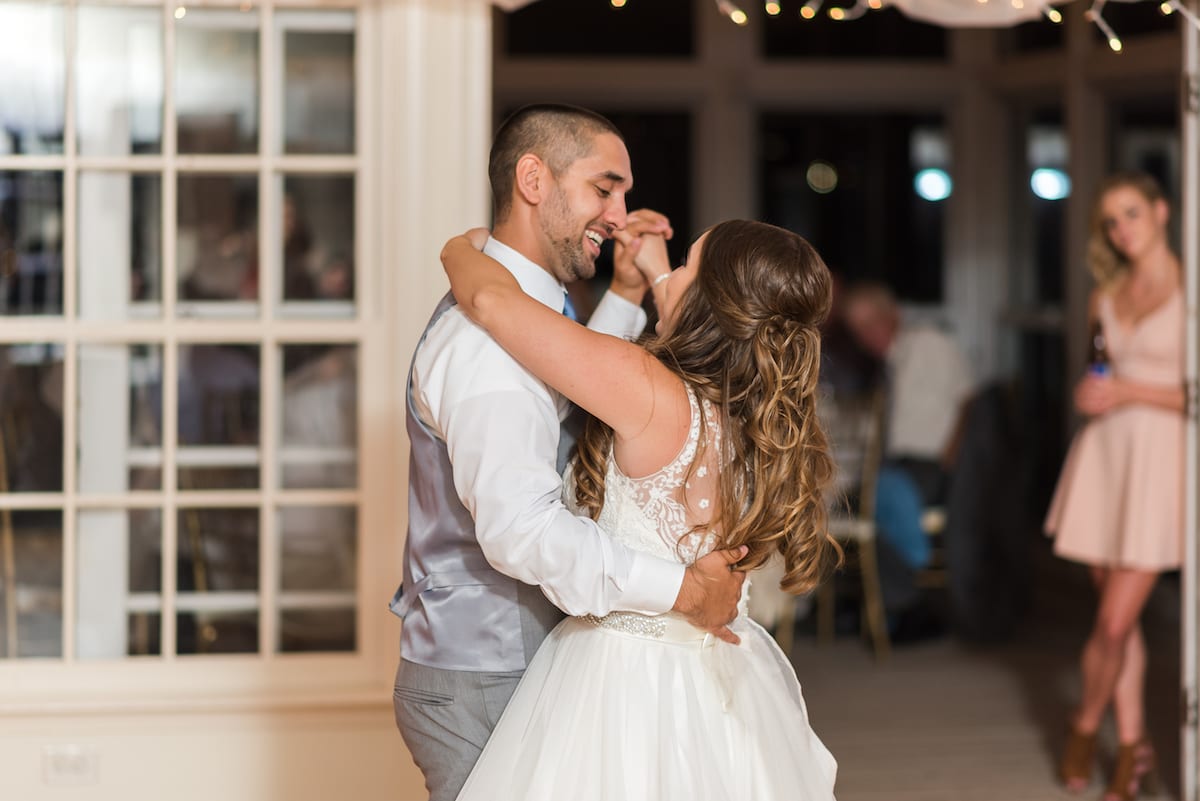Final celebration moment as bride and groom walk together at golden hour at Willow Ridge Manor wedding