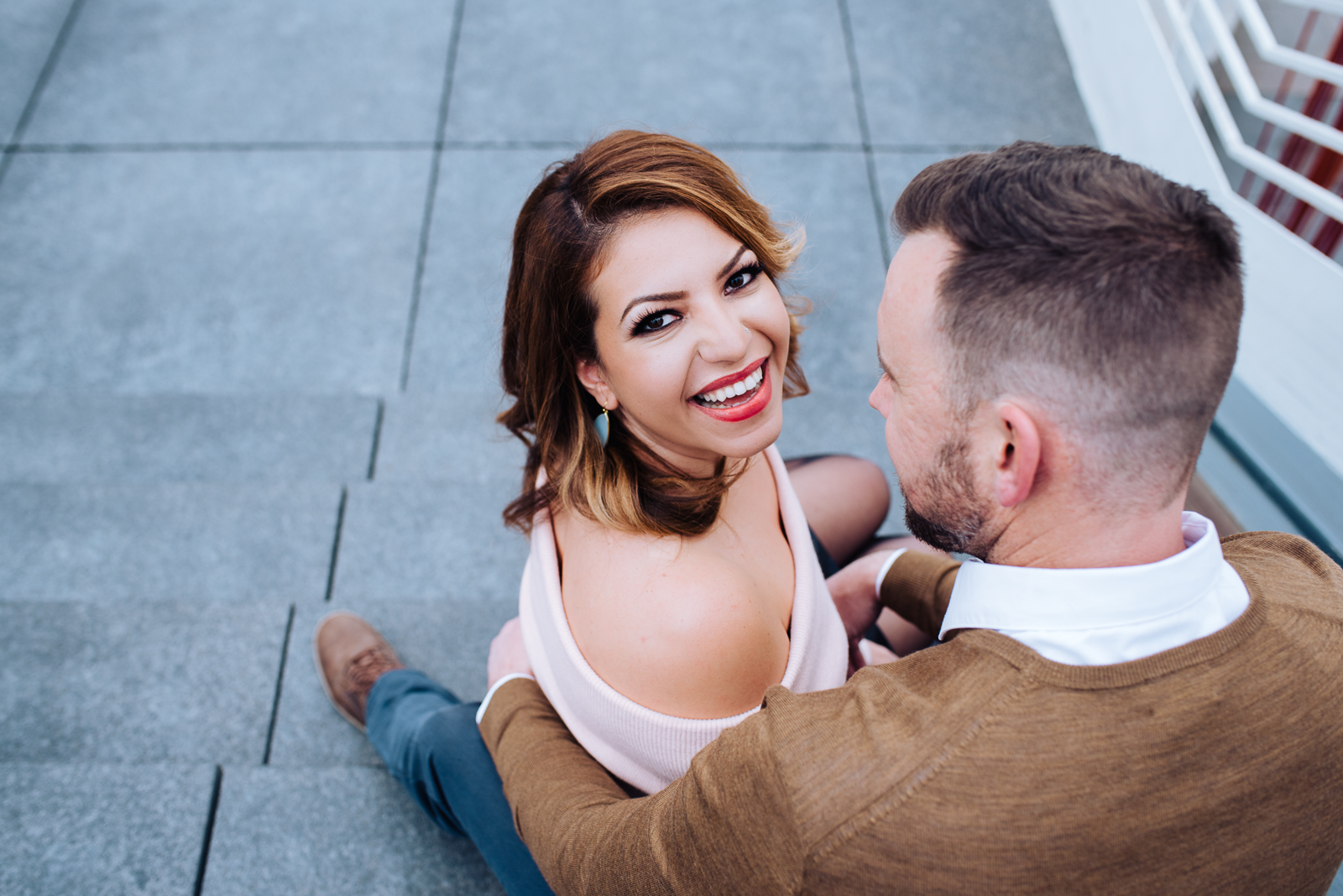 The Quintessential Denver Engagement | Engagement Photo | Union Station Millennium Bridge | From the Hip Photo