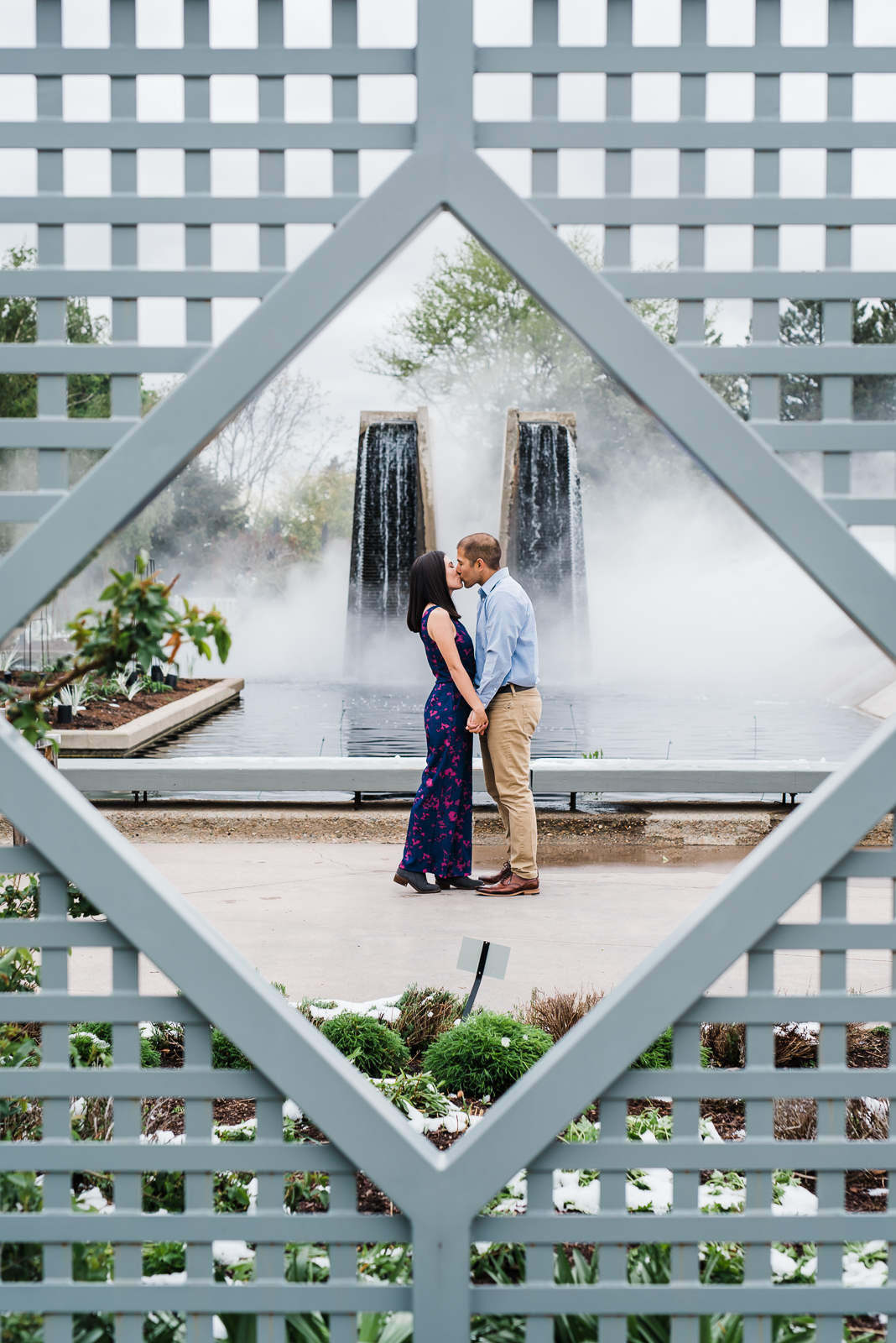 Warm light couple photos Denver Botanic Gardens spring blooms engagement