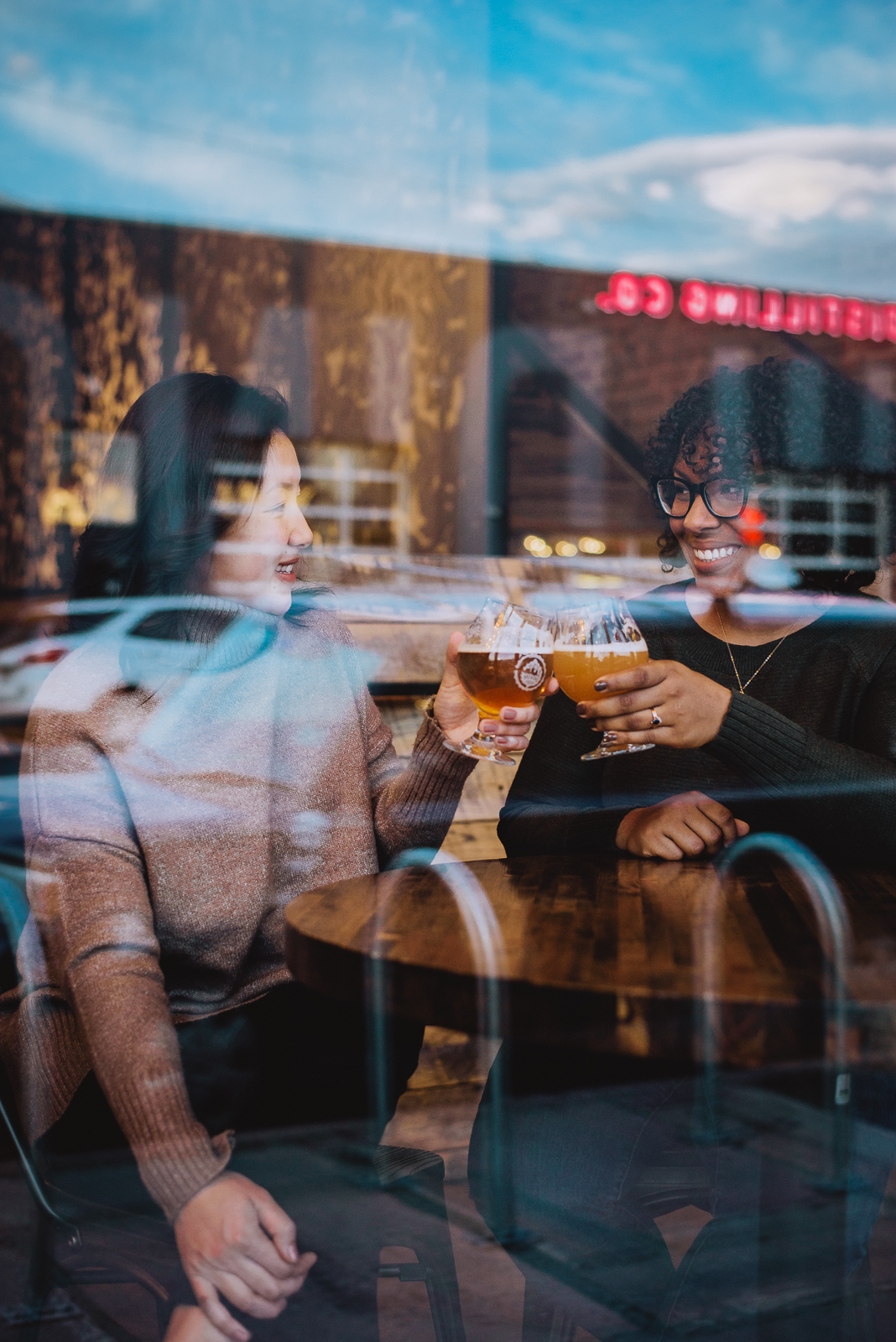 Engagement photos golden hour RiNo murals and brick Denver urban photographer