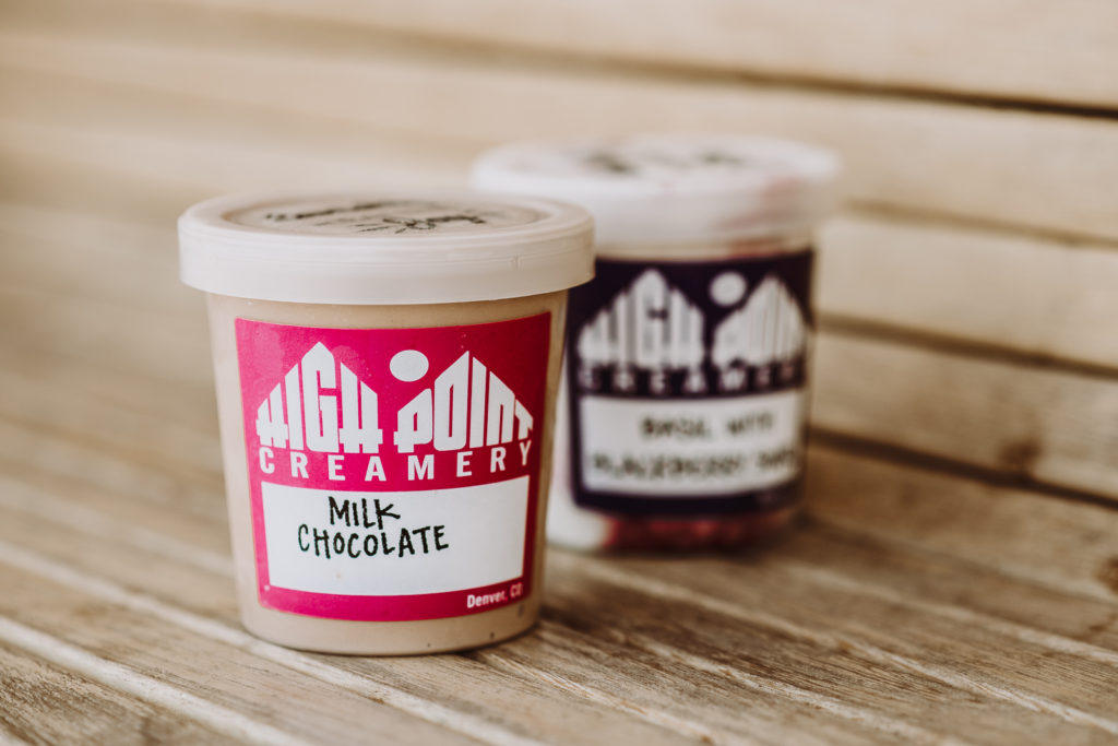 Product Photography | Close up on two different flavored ice cream pints on wooden bench | High Point Creamery, Denver, Colorado
