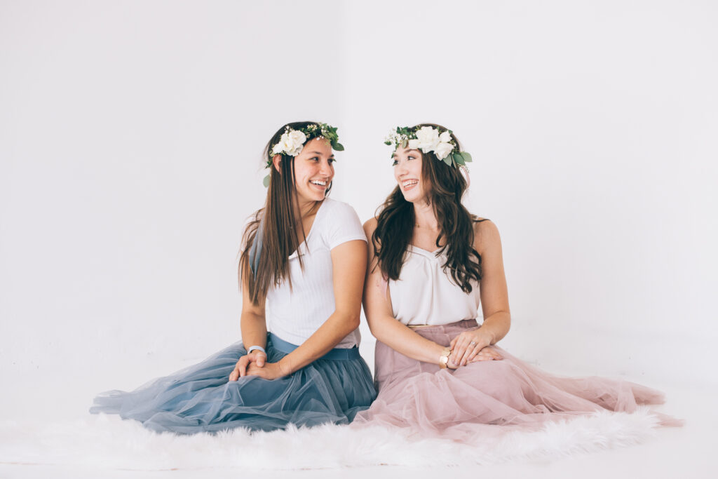 From the Hip Photo Studio indoor candid loving engagement picture | From the Hip Photo Denver Colorado portrait photography