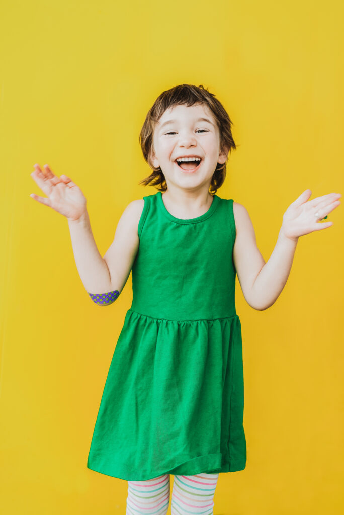 Stanley Marketplace indoor outdoor urban colorful fun candid outgoing family picture | From the Hip Photo Denver Colorado portrait photography