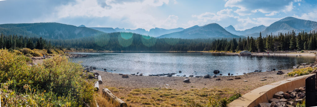 Brainard Lake outdoor lake mountain adventurous fun candid loving engagement picture | From the Hip Photo Denver Colorado portrait photography 