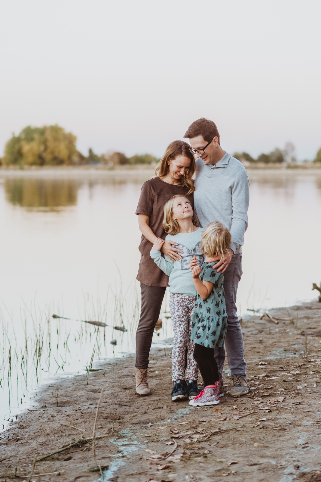 Vertical portrait of woman at Harper Lake during golden hour light