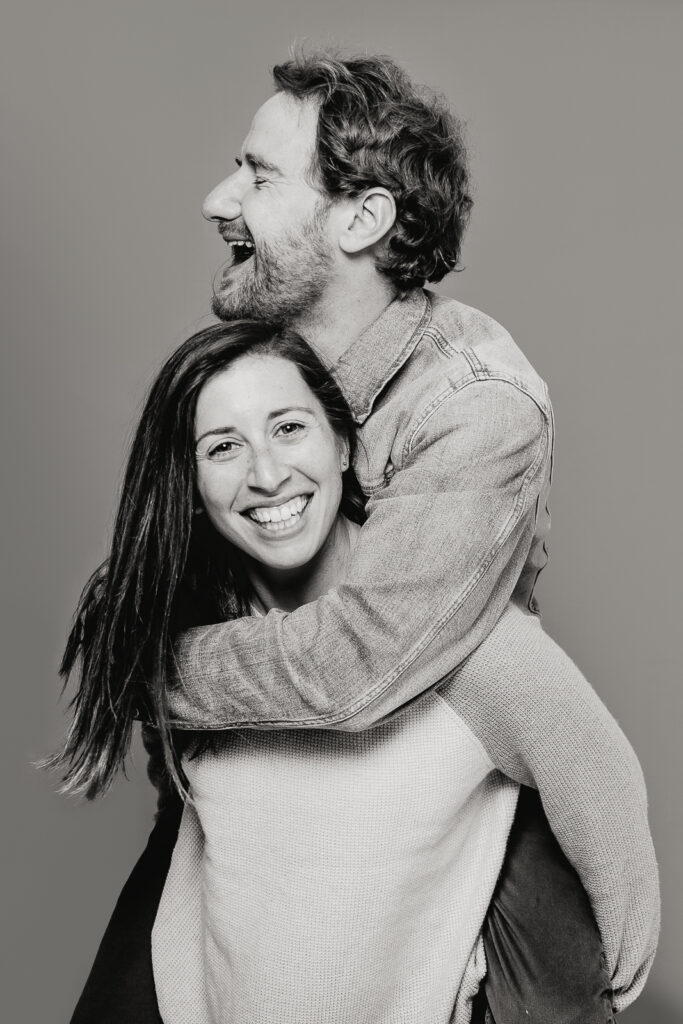 From the Hip Photo Studio indoor candid loving engagement picture | From the Hip Photo Denver Colorado portrait photography