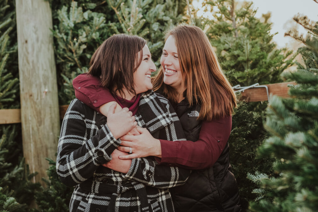Pumpkin Patch Christmas Tree Farm outdoor holiday activity candid fun romantic engagement picture | From the Hip Photo Denver Colorado portrait photography