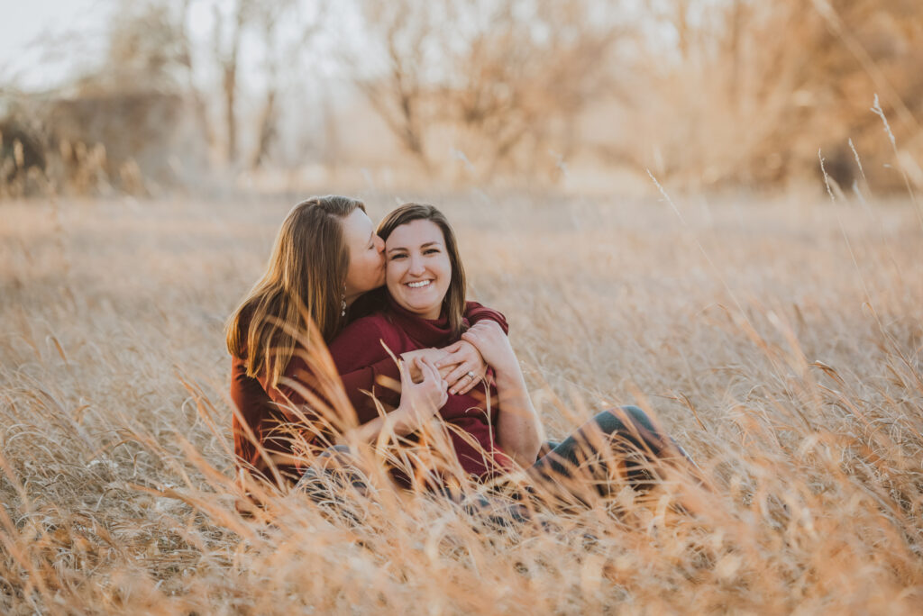 Pumpkin Patch Christmas Tree Farm outdoor holiday activity candid fun romantic engagement picture | From the Hip Photo Denver Colorado portrait photography