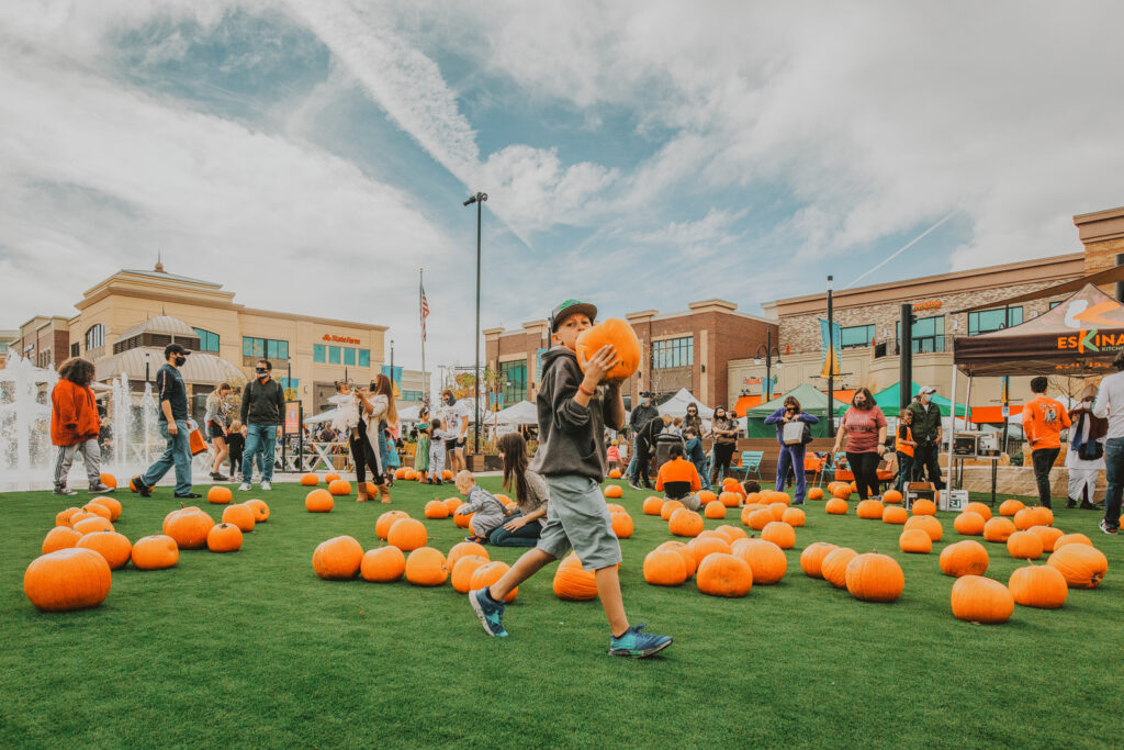 Pumpkin Patch Christmas Tree Farm outdoor holiday activity candid fun loving family picture | From the Hip Photo Denver Colorado portrait photography