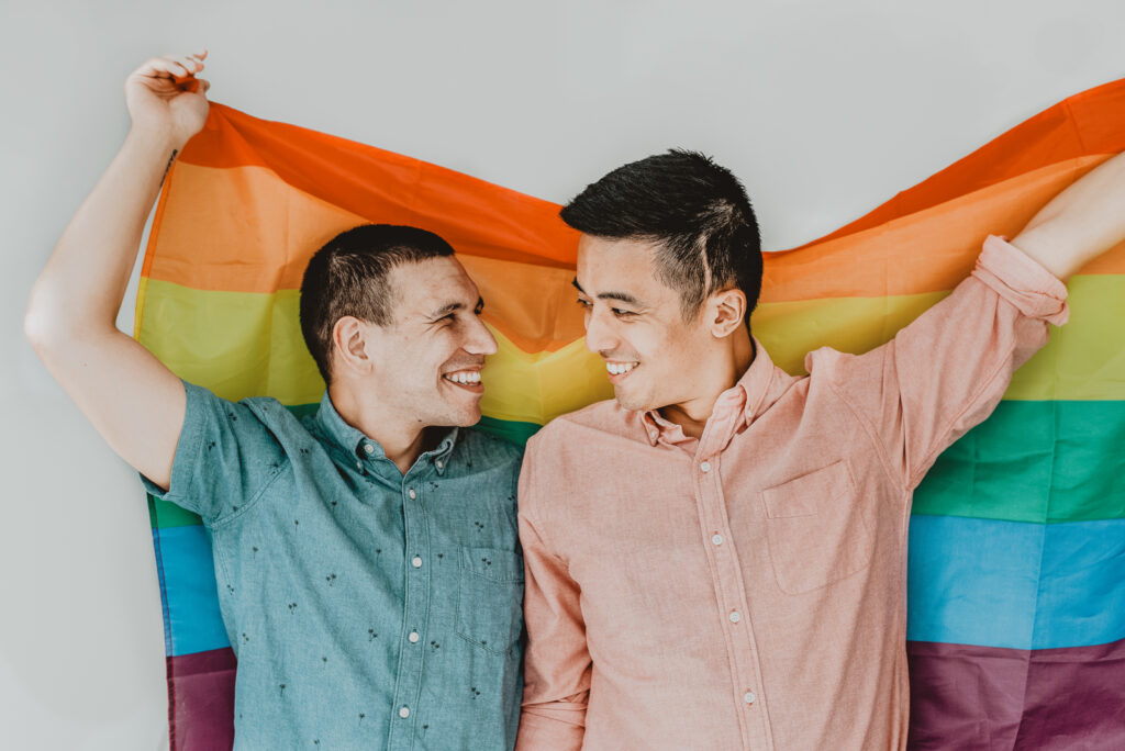 From the Hip Photo Studio indoor candid loving engagement picture | From the Hip Photo Denver Colorado portrait photography