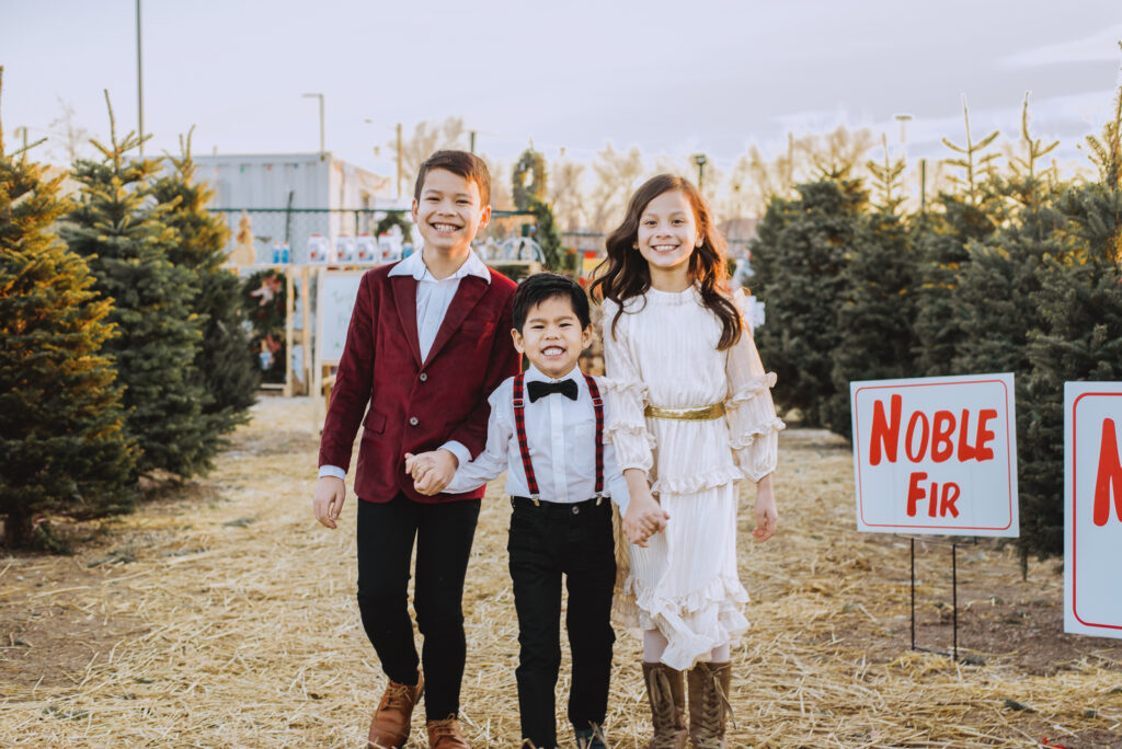Pumpkin Patch Christmas Tree Farm outdoor holiday activity candid fun loving family picture | From the Hip Photo Denver Colorado portrait photography