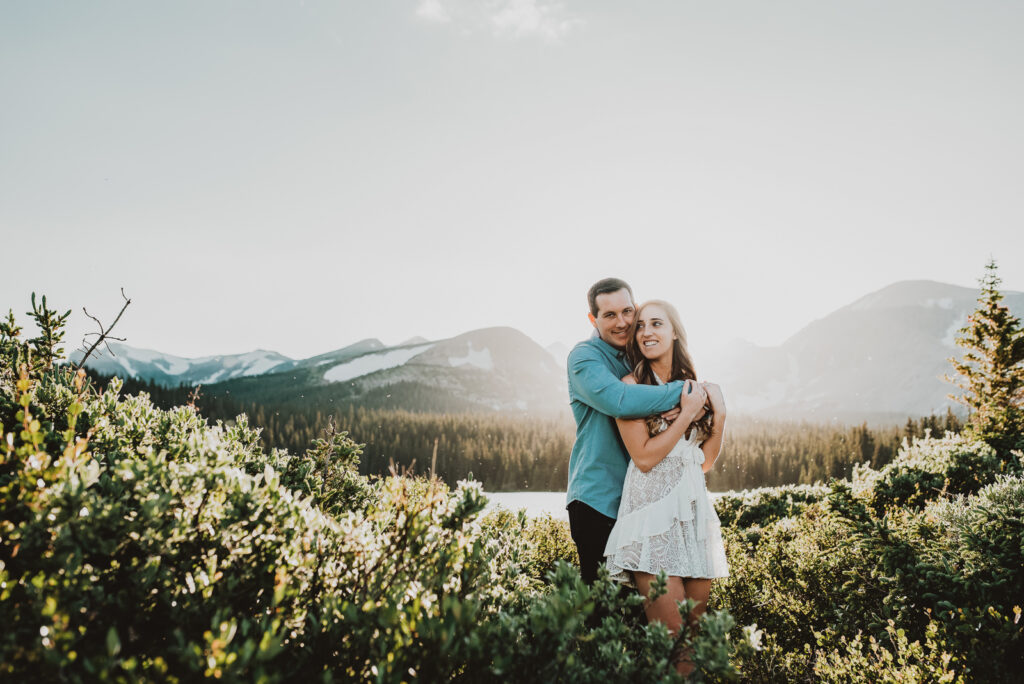 Brainard Lake outdoor lake mountain adventurous fun candid loving engagement picture | From the Hip Photo Denver Colorado portrait photography 