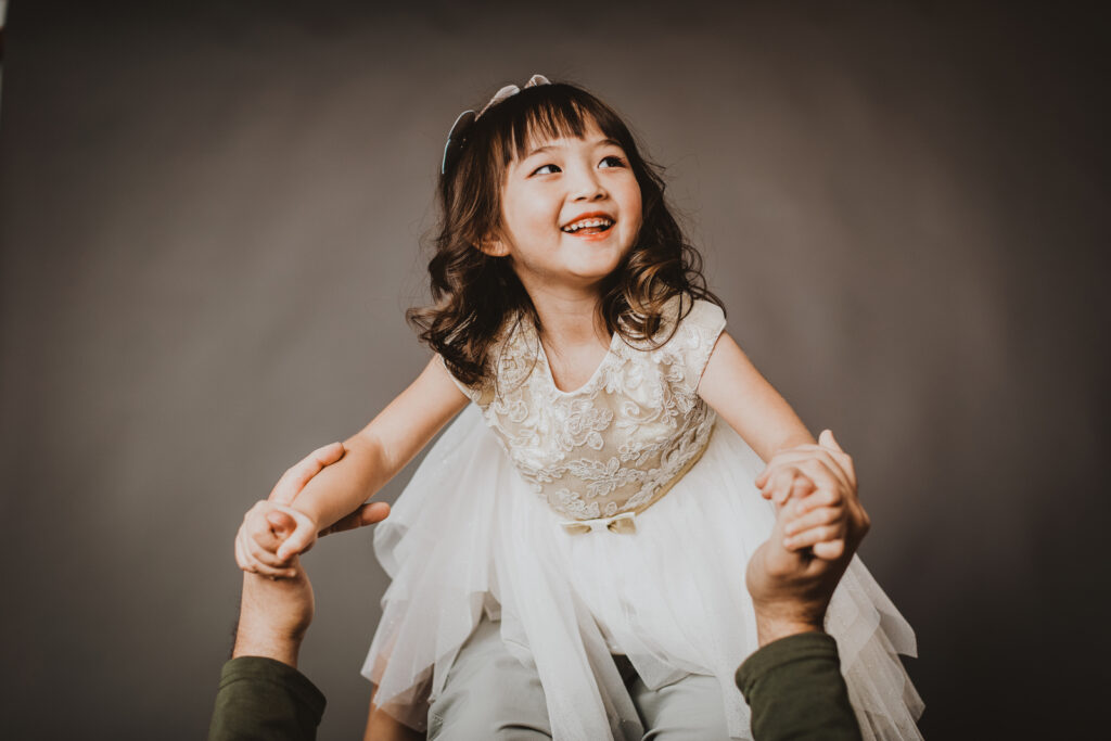 From the Hip Photo Studio indoor candid fun loving family picture | From the Hip Photo Denver Colorado portrait photography