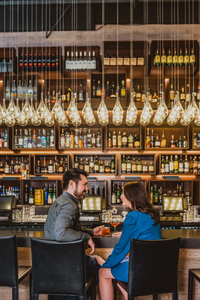 Your Favorite Spot restaurant bar coffee shop bookstore candid fun unique engagement picture | From the Hip Photo Denver Colorado portrait photography 