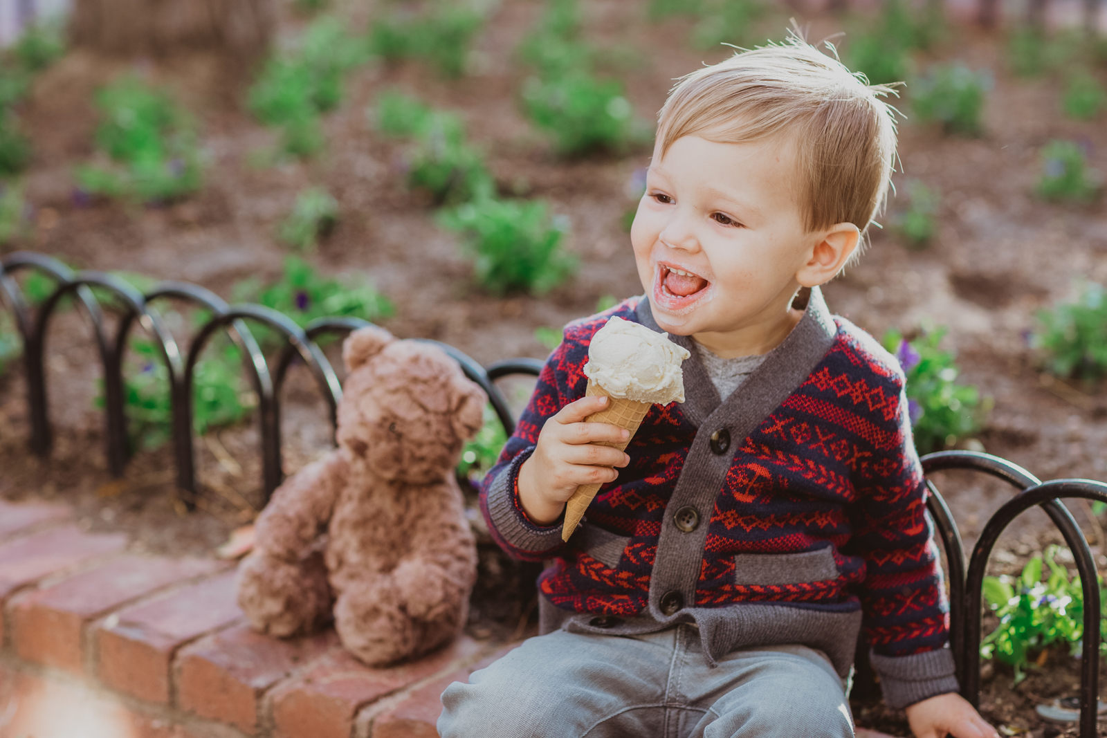 Couple walking together on Pearl Street Boulder during engagement photo session