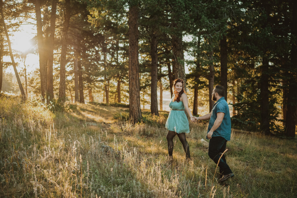 Meyer Ranch Park outdoor mountain trail park adventurous candid fun engagement picture | From the Hip Photo Denver Colorado portrait photography 