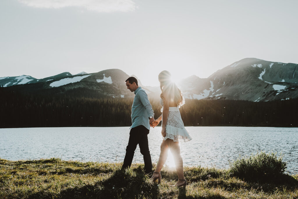 Brainard Lake outdoor lake mountain adventurous fun candid loving engagement picture | From the Hip Photo Denver Colorado portrait photography 