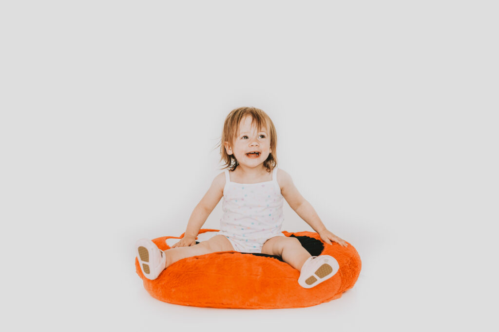 From the Hip Photo Studio indoor candid fun family picture | From the Hip Photo Denver Colorado portrait photography