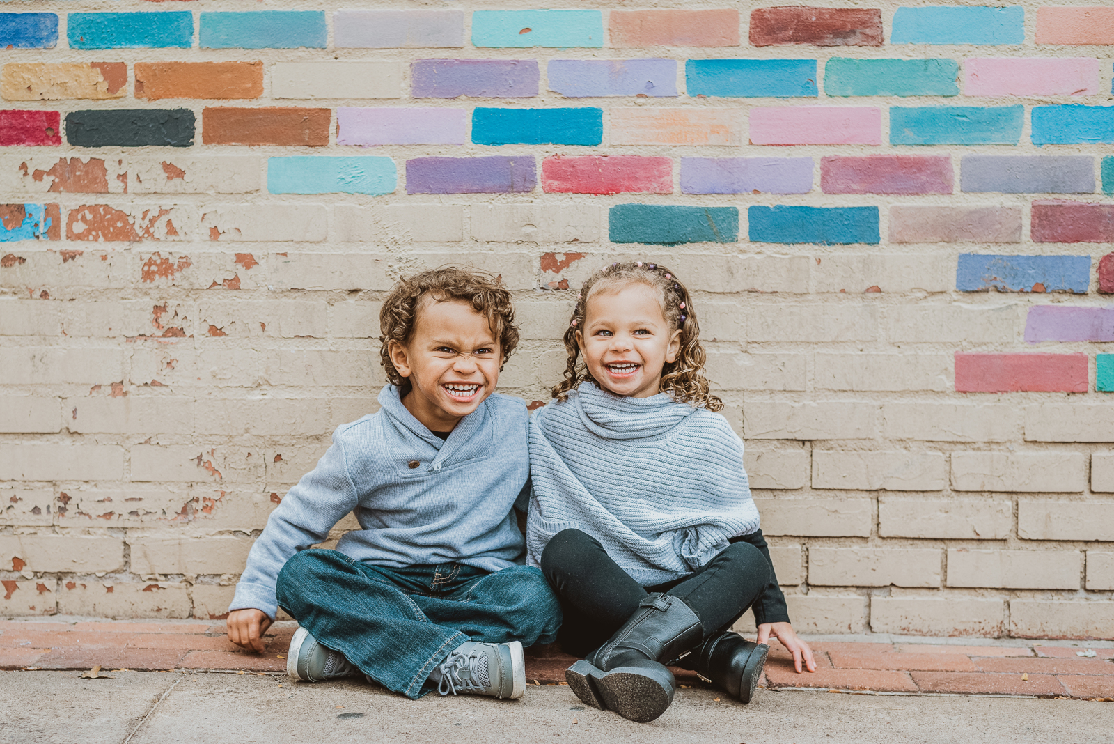 Family group portrait at Boulder Pearl Street showing multiple people in outdoor setting