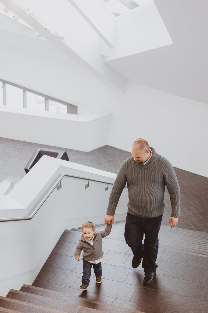 Downtown Civic Center Denver Art Museum indoor fun candid family picture | From the Hip Photo Denver Colorado portrait photography 