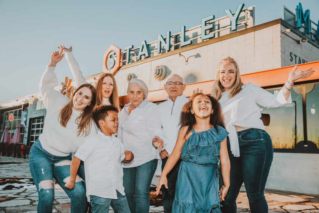 Stanley Marketplace indoor outdoor urban colorful fun candid outgoing family picture | From the Hip Photo Denver Colorado portrait photography