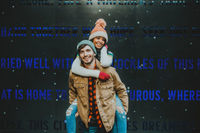 Downtown Denver Dairy Block outdoor urban fun candid romantic engagement picture | From the Hip Photo Denver portrait photography