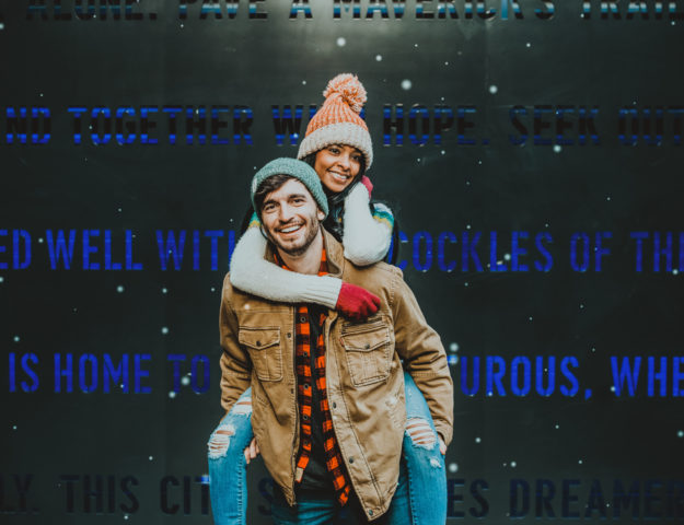 Downtown Denver Dairy Block outdoor urban fun candid romantic engagement picture | From the Hip Photo Denver portrait photography
