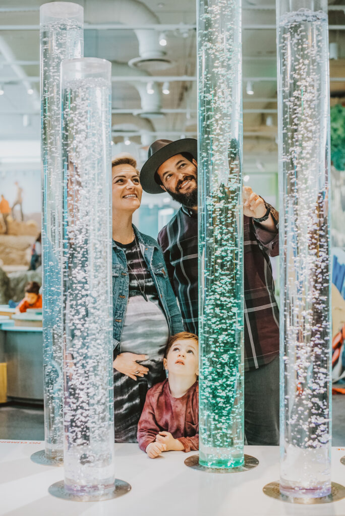 City Park & Denver Museum of Nature and Science Colorado outdoor and indoor nature lake candid fun maternity pictures | From the Hip Photo portrait photography 