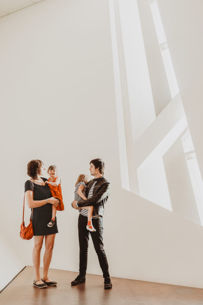 Downtown Civic Center Denver Art Museum indoor fun candid family picture | From the Hip Photo Denver Colorado portrait photography 