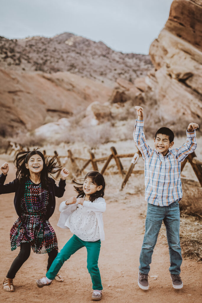 Red Rocks Park and Amphitheater outdoor park nature venue fun candid family picture | From the Hip Photo portrait photography  