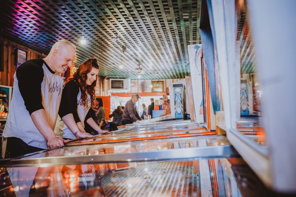 Your Favorite Spot restaurant bar coffee shop bookstore candid fun unique engagement picture | From the Hip Photo Denver Colorado portrait photography 