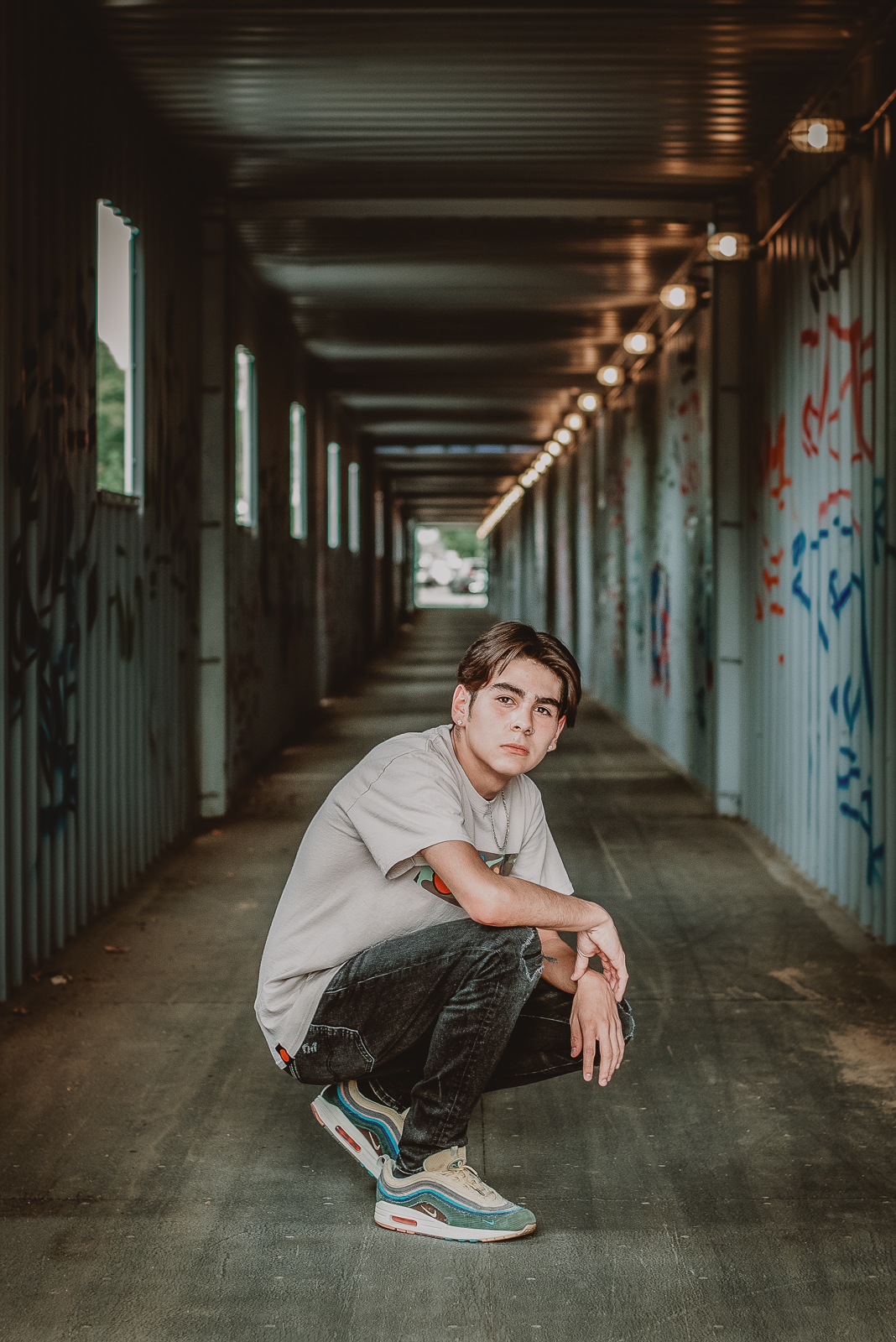Engagement photography in RiNo Art District Denver with colorful mural backdrop