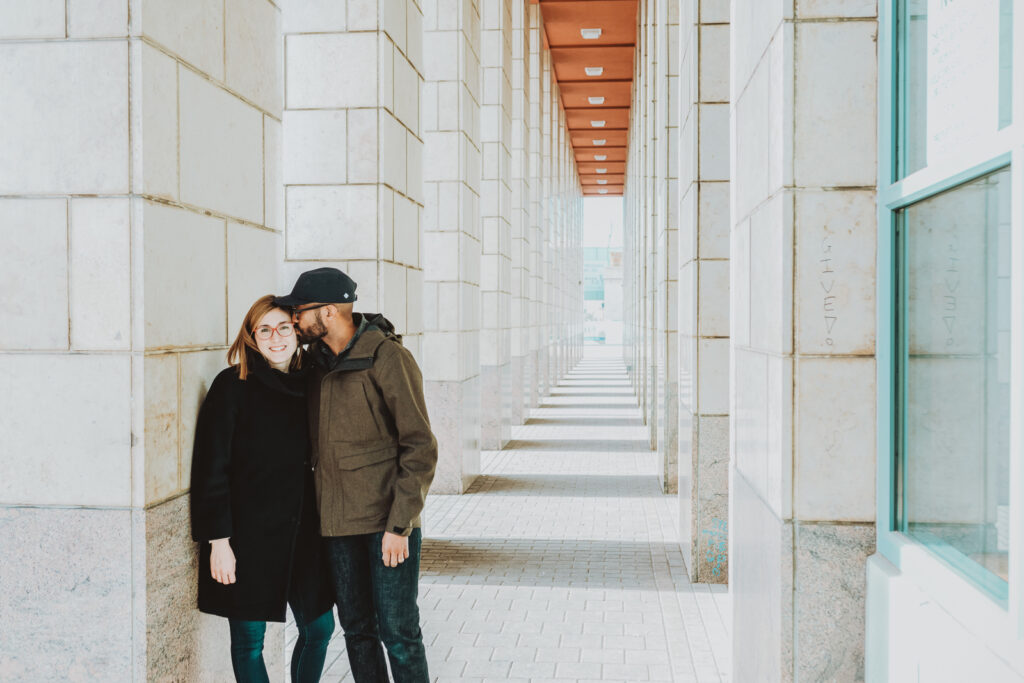 Downtown Civic Center Denver Public Library outdoor fun candid engagement picture | From the Hip Photo Denver Colorado portrait photography 