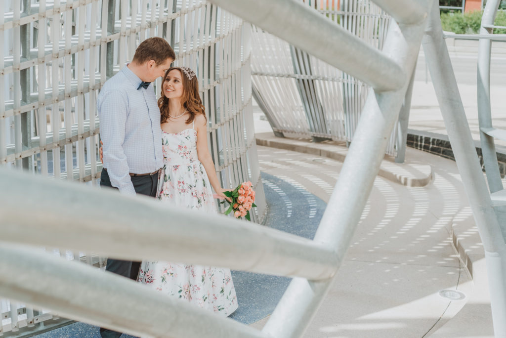 Downtown Denver Dairy Block outdoor urban fun candid loving wedding picture | From the Hip Photo Denver portrait photography 