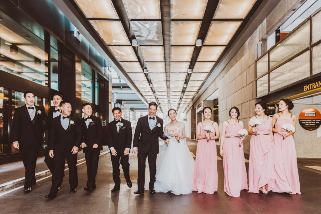 Downtown Denver Dairy Block outdoor urban fun candid loving wedding picture | From the Hip Photo Denver portrait photography 