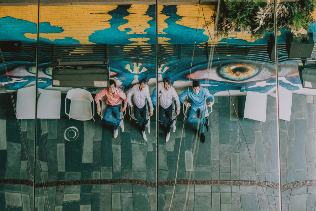 Downtown Denver Dairy Block outdoor urban fun candid loving family picture | From the Hip Photo Denver portrait photography 