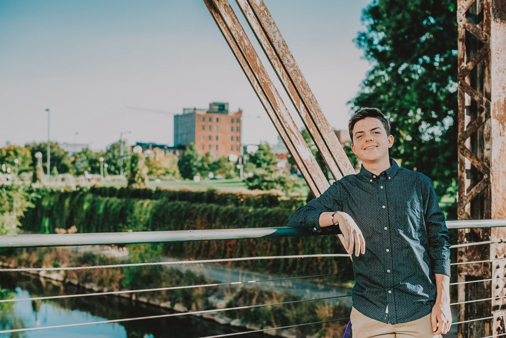 Downtown Denver Dairy Block outdoor urban fun candid loving senior portrait picture | From the Hip Photo Denver portrait photography 